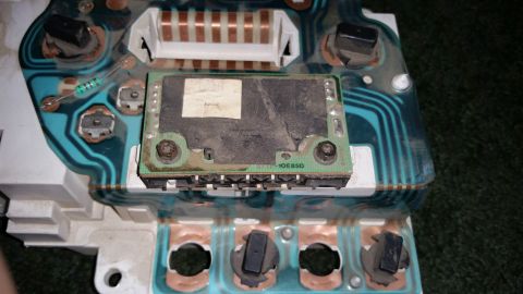 1991 Ford F-250 - Circuit board with visible components and wiring traces, likely from an older vehicle's instrument cluster.