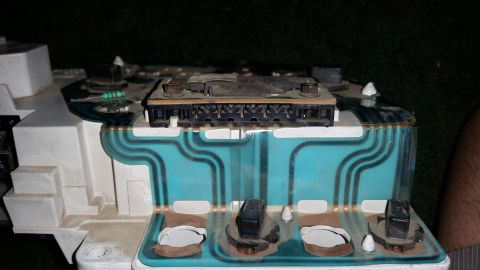 1991 Ford F-250 - Close-up view of the internal circuitry and connectors of a vehicle's instrument cluster.