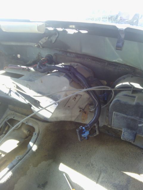 1978 Ford Bronco - Wiring harness and dashboard components visible inside a vehicle's interior.