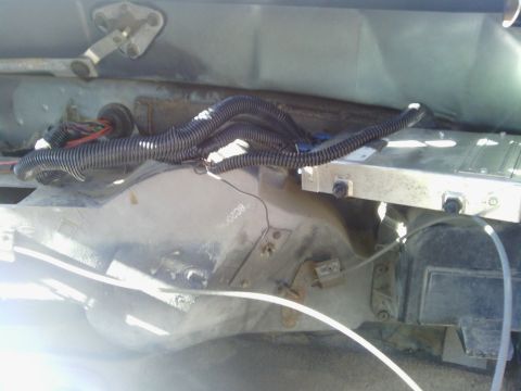 1978 Ford Bronco - Close-up view of the engine bay, showing electrical wiring and a computer module.