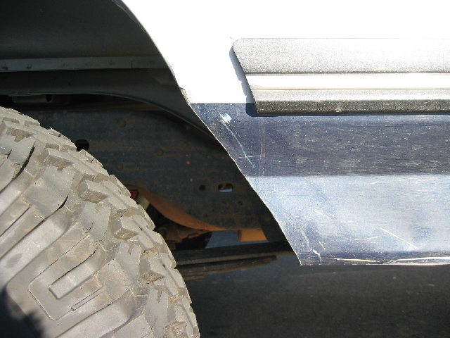front edge of rear fender