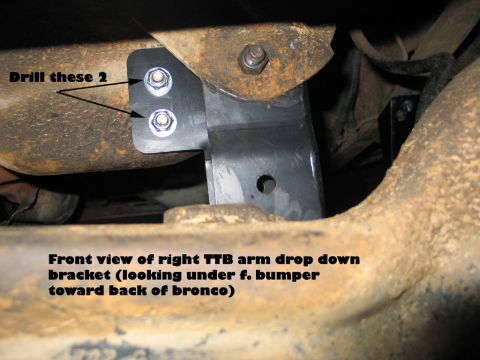 1995 Ford Bronco - Installation of a TTB arm drop down bracket on a vehicle's frame.