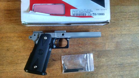1996 Ford Bronco - A firearm frame labeled '2011' is shown with a bag of parts and its original packaging.