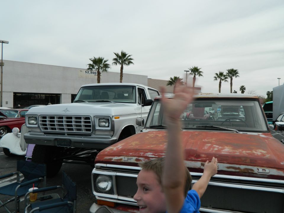 White 1979 Ford Bronco front 3/4 view, lifted with large grille