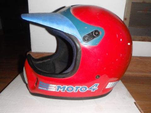1966 Ford Bronco - Red motorcycle helmet with blue visor and