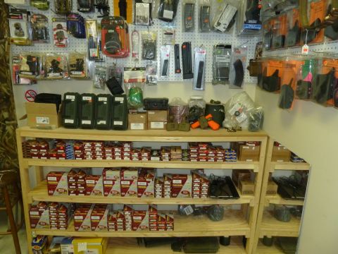 1992 Ford Mustang - A retail store's interior displays merchandise on shelves and pegboards.
