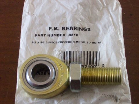1982 Ford F-100 - A close-up of a rod end bearing, part number JM10, from F.K. BEARINGS, is shown in its packaging.
