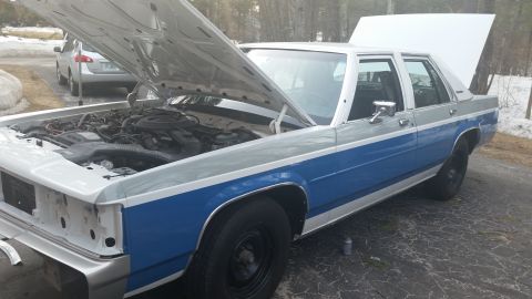 1991 Ford LTD Crown Victoria - This 1991 Ford Crown Victoria LTD is shown with its hood and trunk open.