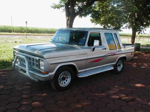 1970 Ford F-100 - This 1970 Ford F-100 pickup truck is shown from a three-quarter front angle.