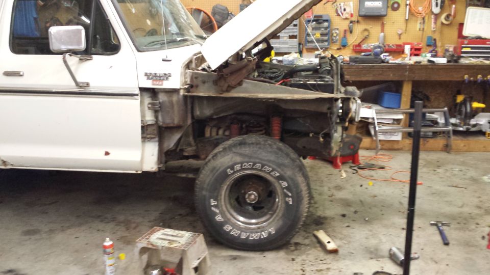 1978 Ford Bronco front quarter view, white, hood open, fender removed