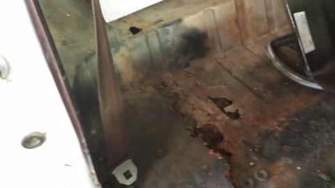 1978 Ford Bronco - The floor of this vehicle is heavily rusted and has several holes.