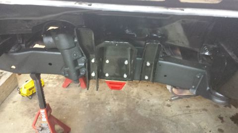 1978 Ford Bronco - Close-up view of vehicle frame components and steering mechanism.