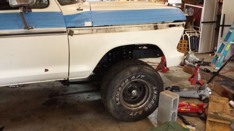 1978 Ford Bronco - This 1978 Ford F-150 truck is shown from the side while it is being worked on.