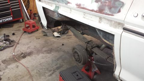 1978 Ford Bronco - This 1978 Ford Bronco is undergoing repairs, with its rear axle and leaf springs exposed.