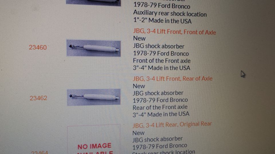 White shock absorber with black fittings