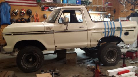 1978 Ford Bronco - This 1978 Ford Bronco is in a garage, elevated on blocks for work.