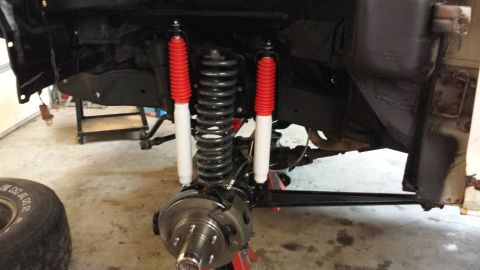 1978 Ford Bronco - Front suspension components, including shocks and springs, are shown during a repair or upgrade.