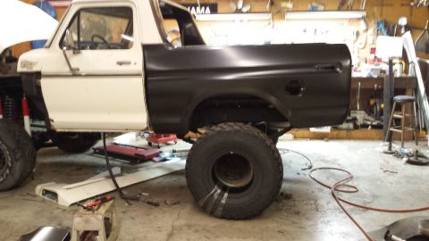 1978 Ford Bronco - This 1978 Ford Bronco is in a shop for bodywork, showing a new black quarter panel.