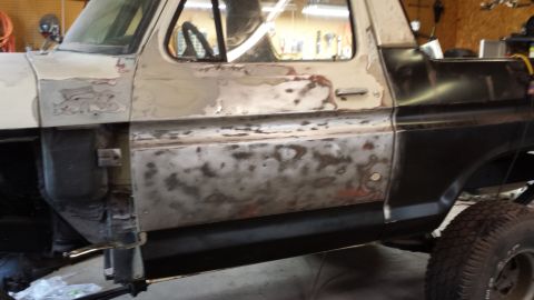 1978 Ford Bronco - This 1978 Ford Bronco shows significant bodywork in progress on its driver's side.