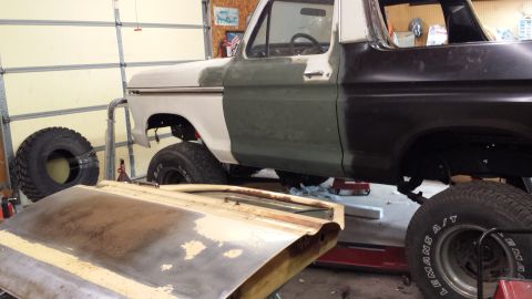 1978 Ford Bronco - This 1978 Ford Bronco is in the process of being restored, with its body panels in primer and a door removed.