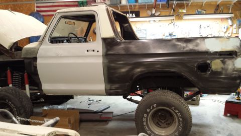 1978 Ford Bronco - This 1978 Ford Bronco is in a garage, likely being prepped for paint or repair.