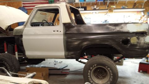1978 Ford Bronco - This 1978 Ford Bronco is in a workshop, showing its bodywork in progress.