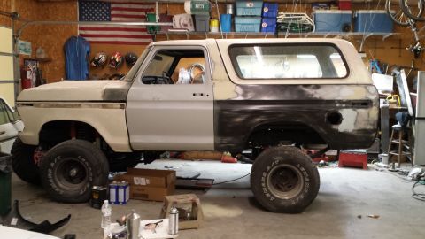 1978 Ford Bronco - This 1978 Ford Bronco is in a garage, showing signs of bodywork and repair.