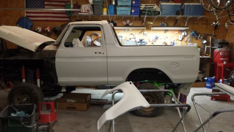 1978 Ford Bronco - This 1978 Ford Bronco is in a garage, appearing to be in the middle of a restoration project.