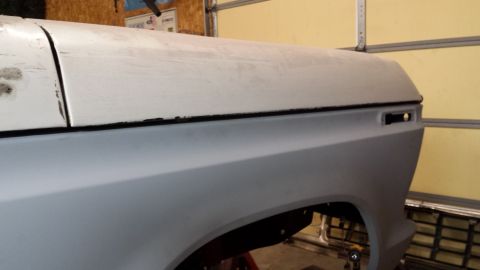 1978 Ford Bronco - This 1978 Ford Bronco is undergoing restoration, showing its primer gray fender and hood.