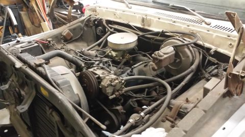 1978 Ford Bronco - Engine bay of a 1978 Ford Bronco, showing the V8 engine and associated components.