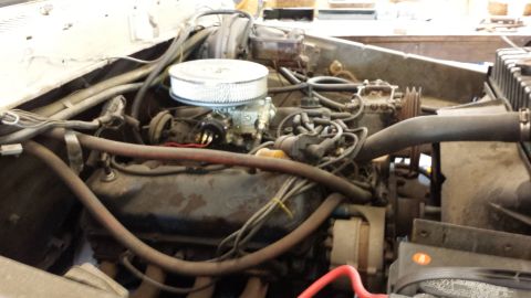 1978 Ford Bronco - Close-up view of the engine compartment, showing the carburetor and air filter assembly.