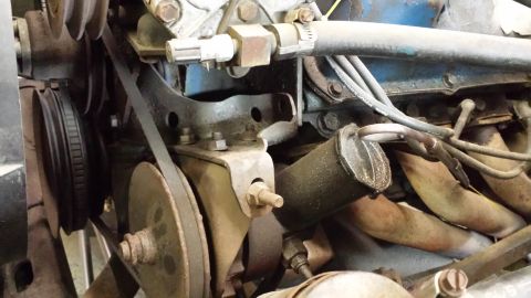 1978 Ford Bronco - Close-up view of engine components, including belts and pulleys, with a Supermotors.net watermark.