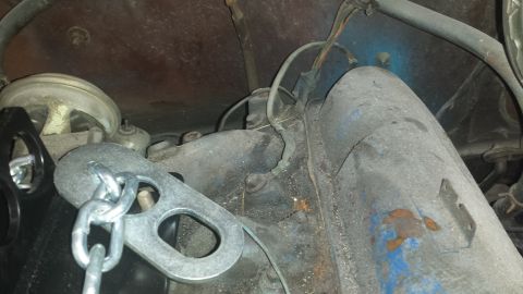 1978 Ford Bronco - Close-up view of engine parts and a chain hoist, with SuperMotors.net logo visible.