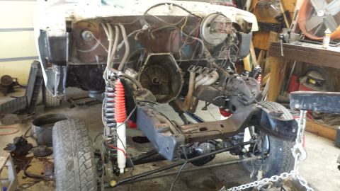 1978 Ford Bronco - This vehicle is undergoing a major repair or restoration, with the engine and some body panels removed.