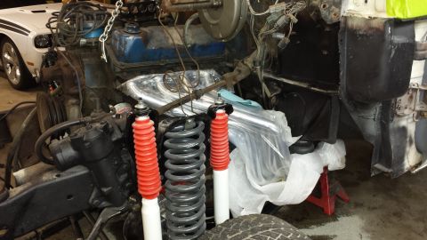 1978 Ford Bronco - Engine and suspension components are laid out for installation or repair.