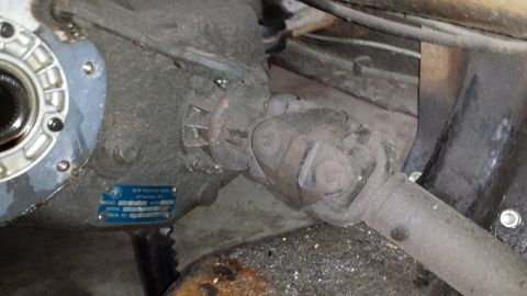 1978 Ford Bronco - This image shows the transfer case and driveshaft of a vehicle, not the entire vehicle itself.