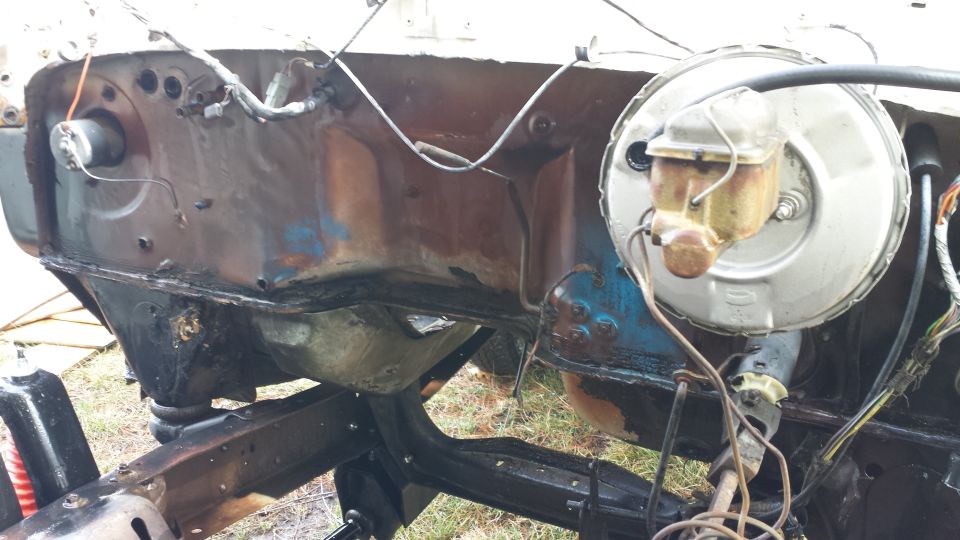 Engine bay firewall and brake booster assembly