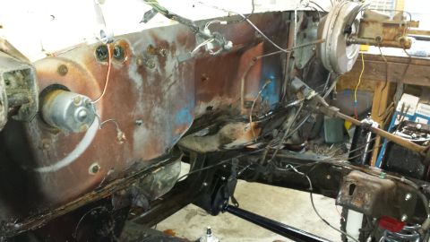 1978 Ford Bronco - Firewall and engine bay components of a vehicle undergoing restoration or repair.