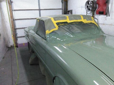 1960 Ford Ranchero - 1960 Ford Ranchero covered for paint work in a garage.