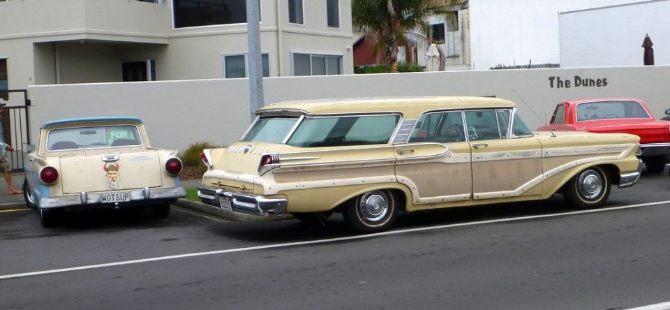 Rear view of a 1958 Mercury Voyager wagon with wood paneling