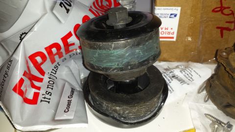 1991 Buick Reatta - This engine mount part features rubber isolators and visible green banding, likely indicating its function.
