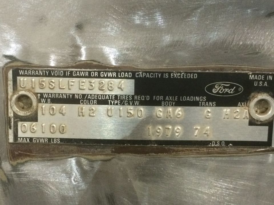 1979 Ford VIN plate stamped U15SLFE3284 with 104 W.B., color H2, U150 type and GA6 body codes