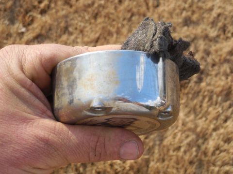 1983 Ford Bronco - This greasy, dirty dust cap soaked in kerosene for about an hour, and then was nylon-brushed to get as clean as it is on the Left. A few se…