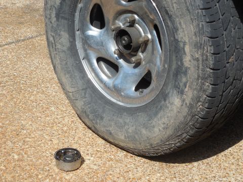 1983 Ford Bronco - The hub locks & their dust caps (including the dials for manual locks) do not support any weight or retain any parts. They can be R&I'ed wi…