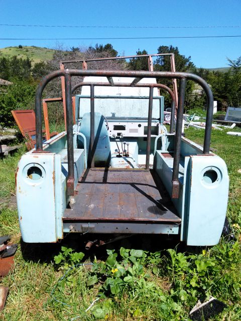 1991 Ford Bronco - This vehicle appears to be a project in progress, stripped down to its frame and body panels.