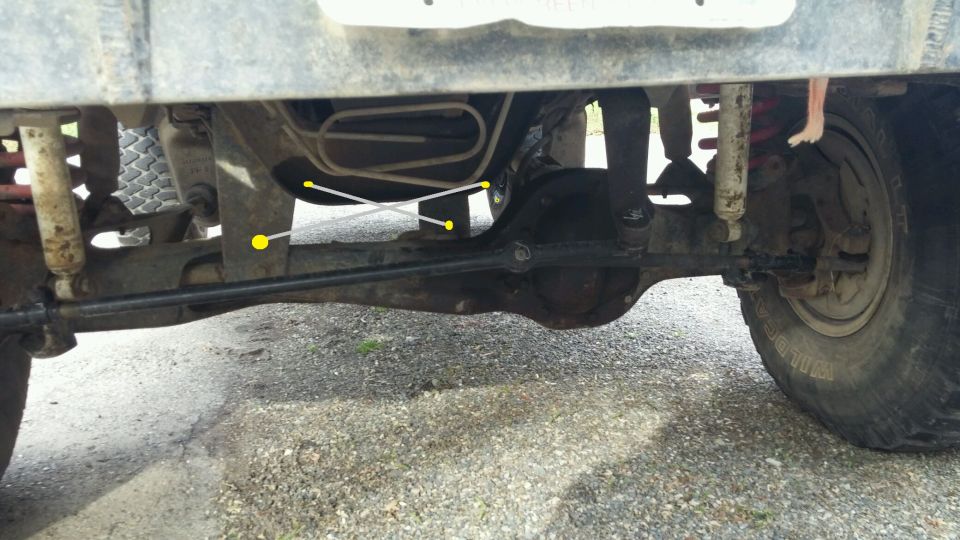 Rear axle, differential, shocks, and suspension parts of a truck