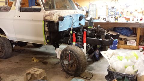 1978 Ford Bronco - This 1978 Ford Bronco is in a workshop, with its front end taken apart for repairs and modifications.