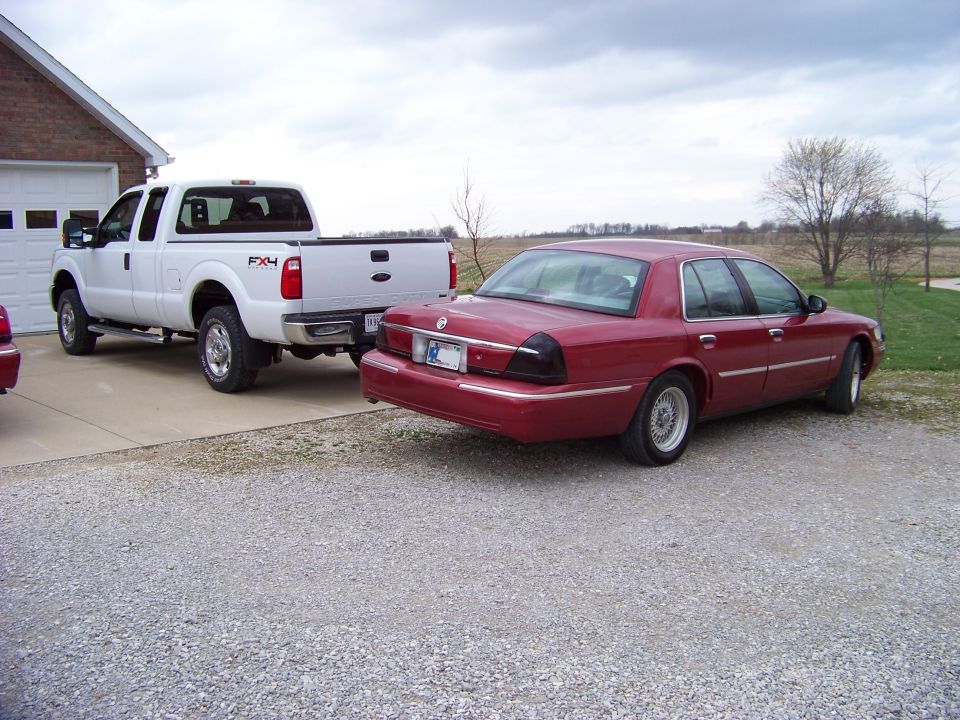 Red 1999 Mercury Grand Marquis, rear view