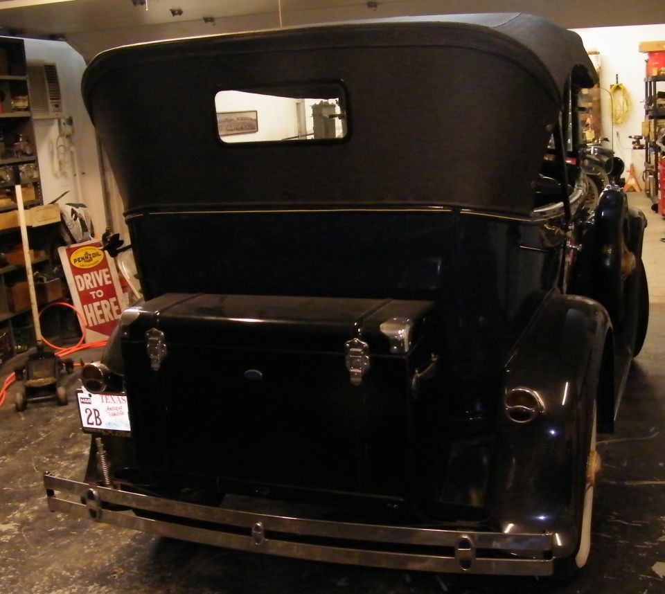 Black 1931 Ford Model A convertible rear view with trunk