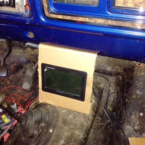 1978 Ford Bronco - Interior view of a 1978 Ford Bronco, a custom screen installation.